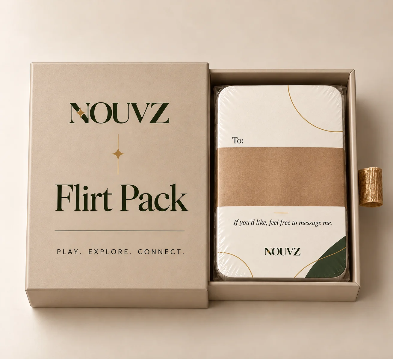Open NOUVZ Flirt Pack box showing the wrapped card stack and gold pull loop